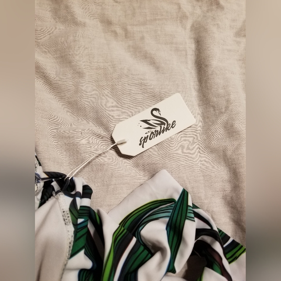 Nwt sexy low cut front and back tie back high cut one piece. Wide straps - Picture 8 of 10